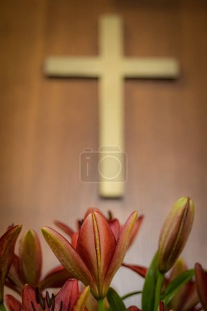 Photo for Church cross in gold color on a wooden base. Altar church with crosses. Soft selective focus. Artificially created grain for the picture - Royalty Free Image