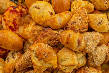 Cheese buns with spices, salty snacks. Bread with cheese filling