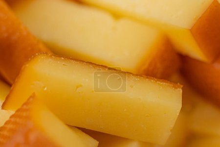 Photo for Cheese snacks in one container. Sliced cheese in different shapes. Cheese board for the celebration - Royalty Free Image