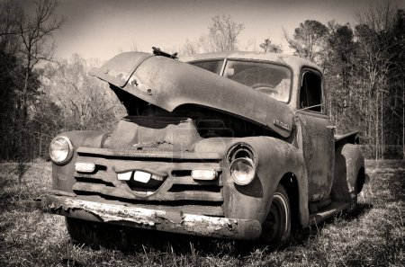 Photo for Old rusty car in the forest - Royalty Free Image