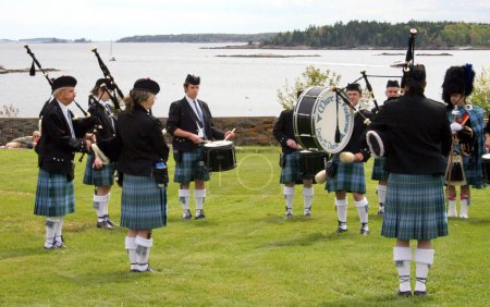 Photo for Bagpipers at the Ocean Shore - Royalty Free Image