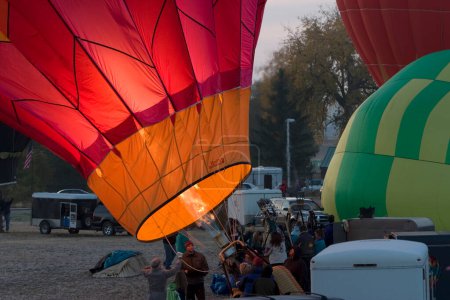 Photo for Inflating hot air balloon before sunrise - Royalty Free Image