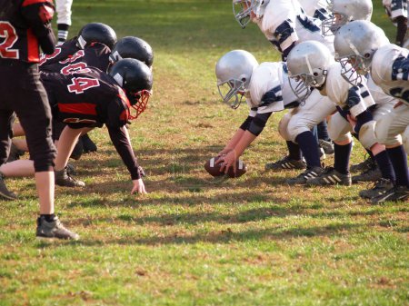 Photo for Football team at the line of scrimmage - Royalty Free Image