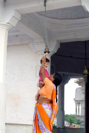 Photo for Indian woman carrying her child - Royalty Free Image