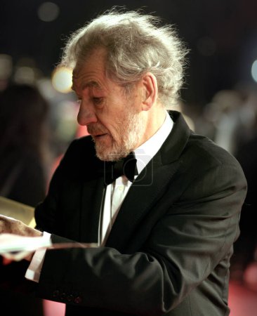 Téléchargez les photos : Ian McKellen arrive aux Orange British Academy Film Awards - en image libre de droit