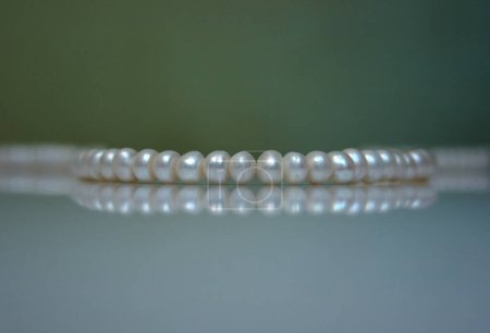 Photo for Old pearl beads on background, close up - Royalty Free Image