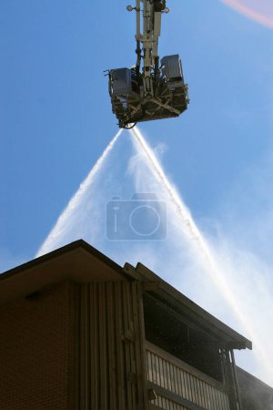 Photo for Firefighters at work, fire fighting concept - Royalty Free Image