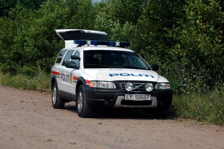 Téléchargez les photos : Norwegian Police car on street - en image libre de droit