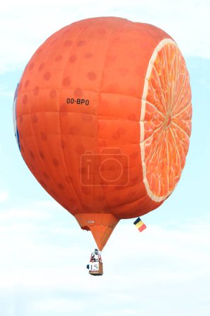 Photo for Orange shaped hot air balloon - Royalty Free Image