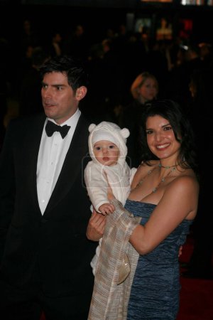 Photo for LONDON - NOVEMBER 27: Chris Weitz, wife Mercedes Martinez and their child attend the World Premiere of 'The Golden Compass' at the Odeon Leicester Square on November 27, 2007 in London, England. - Royalty Free Image