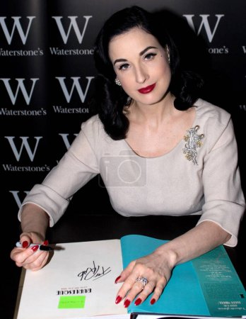 Photo for Dita Von Teese signing her book - Royalty Free Image