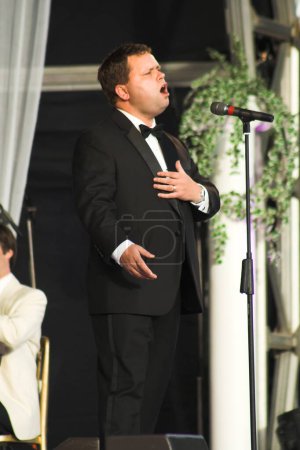 Photo for Paul Potts performing live at Margam Country Park in Neath on 08 July 2007. - Royalty Free Image