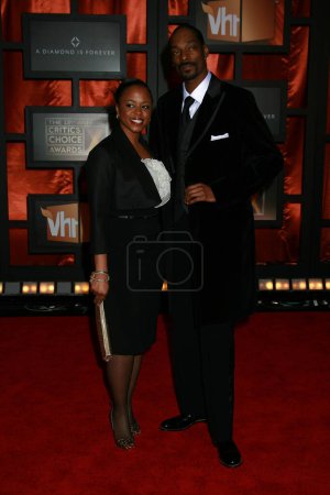 Photo for Rapper Snoop Dogg and wife Shante Broadus arrive at the 13th ANNUAL CRITICS' CHOICE AWARDS at the Santa Monica Civic Auditorium on January 7, 2008 in Santa Monica, California - Royalty Free Image