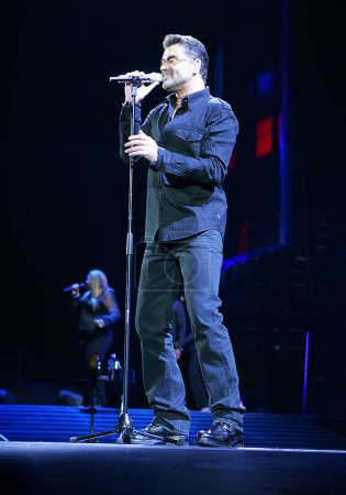 Photo for LOS ANGELES, CA - JUNE 25: Singer George Michael performs onstage during the 2008 "25 Live" tour held at the Forum on June 25, 2008 in Los Angeles, California. - Royalty Free Image