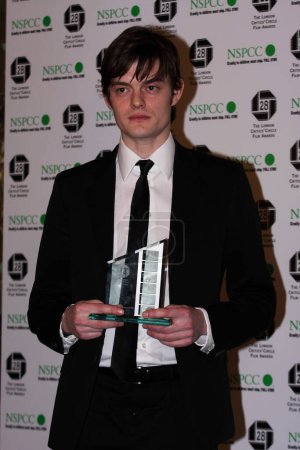 Photo for Sam Riley with the Breakthrough award at the Award of the London Film Critics' Circle (ALFS) at the Grosvenor House Hotel in central London. - Royalty Free Image