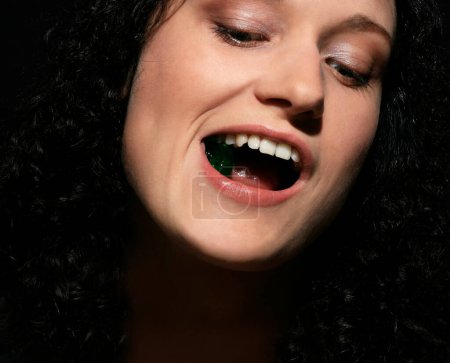 Photo for Girl with jelly in mouth - Royalty Free Image