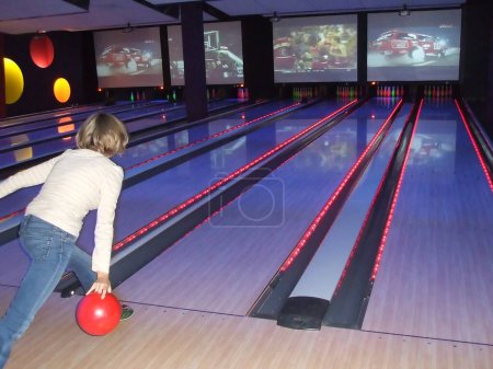 Photo for Person playing Bowling with ball - Royalty Free Image