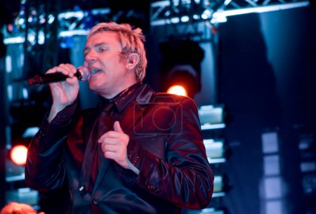 Photo for Simon Le Bon performing on the stage - Royalty Free Image