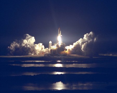 Photo for STS-86 Launch spaceship on blue sky background - Royalty Free Image
