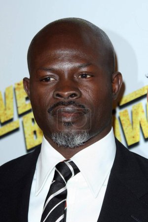 Photo for Djimon Hounsou arrive at the premiere of Summit Entertainment's 'Never Back Down' at the Cinerama Dome, on March 4, 2008 in Hollywood, California - Royalty Free Image