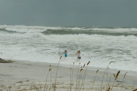 Photo for People on Gulf Coast with waves - Royalty Free Image