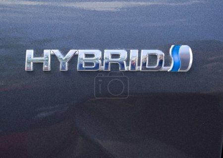 Foto de Hybrid Camry Badging  on background - Imagen libre de derechos