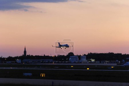 Photo for Evening sunset sky and flying commercial airplane. plane transportation - Royalty Free Image