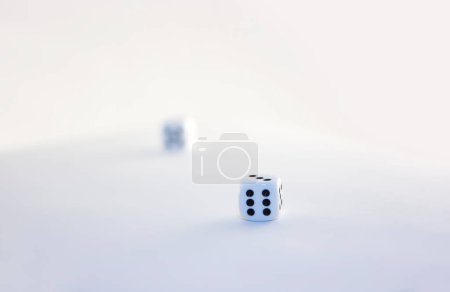 Photo for Dices on white surface - Royalty Free Image
