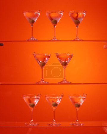 Photo for Shelves with Martini glasses - Royalty Free Image