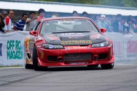 Photo for Drifting competition in Thailand, extreme riding on car - Royalty Free Image