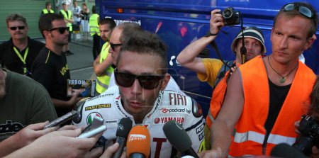Photo for Valentino Rossi, who in early June in Italy Mugello GP suffered an fracture of the leg is testing at Masaryk Circuit on 12 July 2010, in Brno, Czech republic. - Royalty Free Image