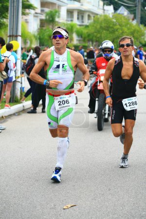 Photo for FLORIANOPOLIS - SANTA CATARINA, BRAZIL, MAY 31: An unidentified competitors races in the Ironman triathlon competition held in Florianopolis - Santa Catarina - Brazil, on May 31, 2009 - Royalty Free Image