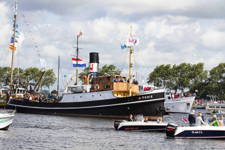Foto de Day Time Shot Of Sail Amsterdam 2010 - Desfile de vela - Imagen libre de derechos