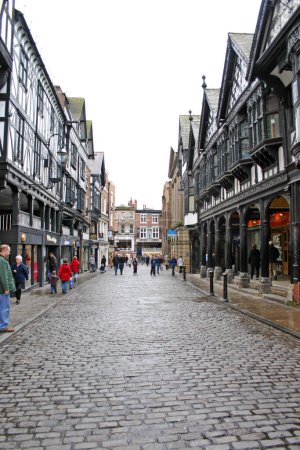 Photo for Tourists and Shoppers on street in Chester, England, UK - Royalty Free Image