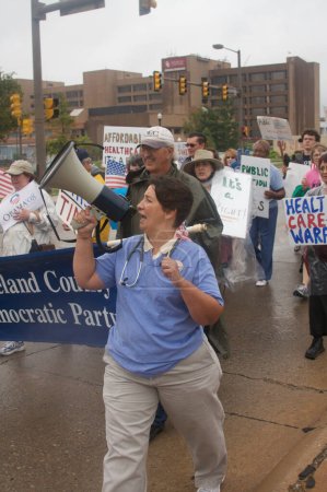 Téléchargez les photos : Manifestants des soins de santé de jour - en image libre de droit