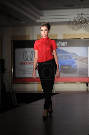 Photo for SIEDLCE, POLAND - NOVEMBER 19: model showcasing designs from Mohito collection walks the catwalk at the Siedlce Fashion Evening on November 19, 2010 in Siedlce, Poland - Royalty Free Image