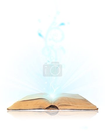 Photo for Open book magic on white background - Royalty Free Image