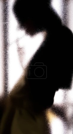 Photo for Girl behind the glass background - Royalty Free Image