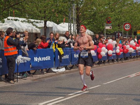Photo for Winners people - copenhagen marathon on background - Royalty Free Image