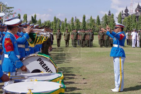 Photo for Conducting a military band - Royalty Free Image