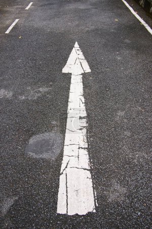 Photo for Asphalt road with arrow - Royalty Free Image