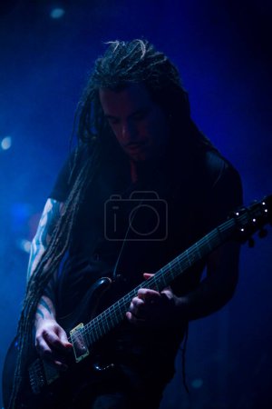Photo for Male Guitarist During Performance On Scene - Royalty Free Image