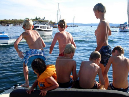 Photo for Scandinavian Lifestyle - kids having fun on the sea - Royalty Free Image