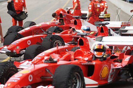 Photo for Row of Ferrari F1 racing cars - Royalty Free Image