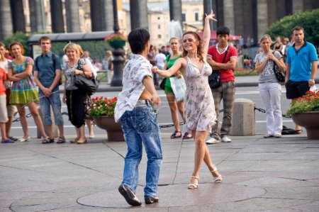Photo for Performers Dancing in the street - Royalty Free Image