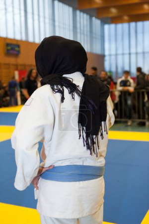 Photo for Muslim fighter during martial arts fight - Royalty Free Image