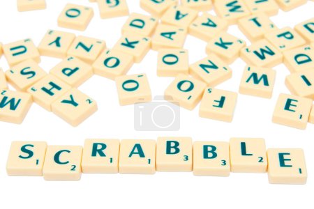 Photo for Scrabble game isolated in white - Royalty Free Image