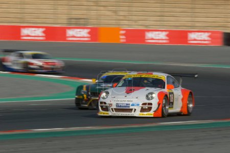 Photo for Racing speed cars at 24 Hour Race at Dubai Autodrome on January 14, 2012 - Royalty Free Image