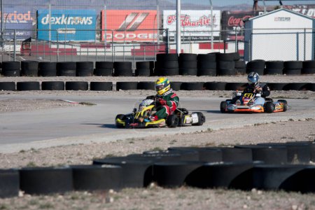 Photo for Teenager racing on go kart, junior league - Royalty Free Image