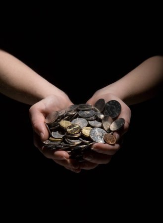 Photo for Hand holding large group of coins - Royalty Free Image